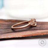 Three Stone Round Trilogy Moissanite Engagement Ring 10k 14k 18k Rose Gold Matte Finish Side Tapered Baguettes Cathedral Ring