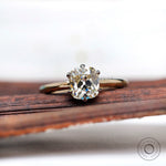 Front view of OMC elongated cushion moissanite two tone ring