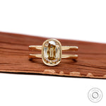 Front view elongated cushion champagne moissanite bezel ring gold
