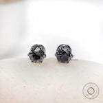 Front view OEC grey moissanite claw prong stud earrings