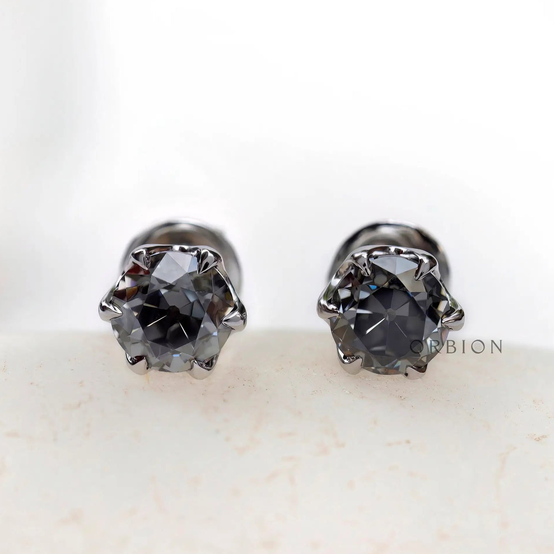 Front view OEC grey moissanite claw prong stud earrings