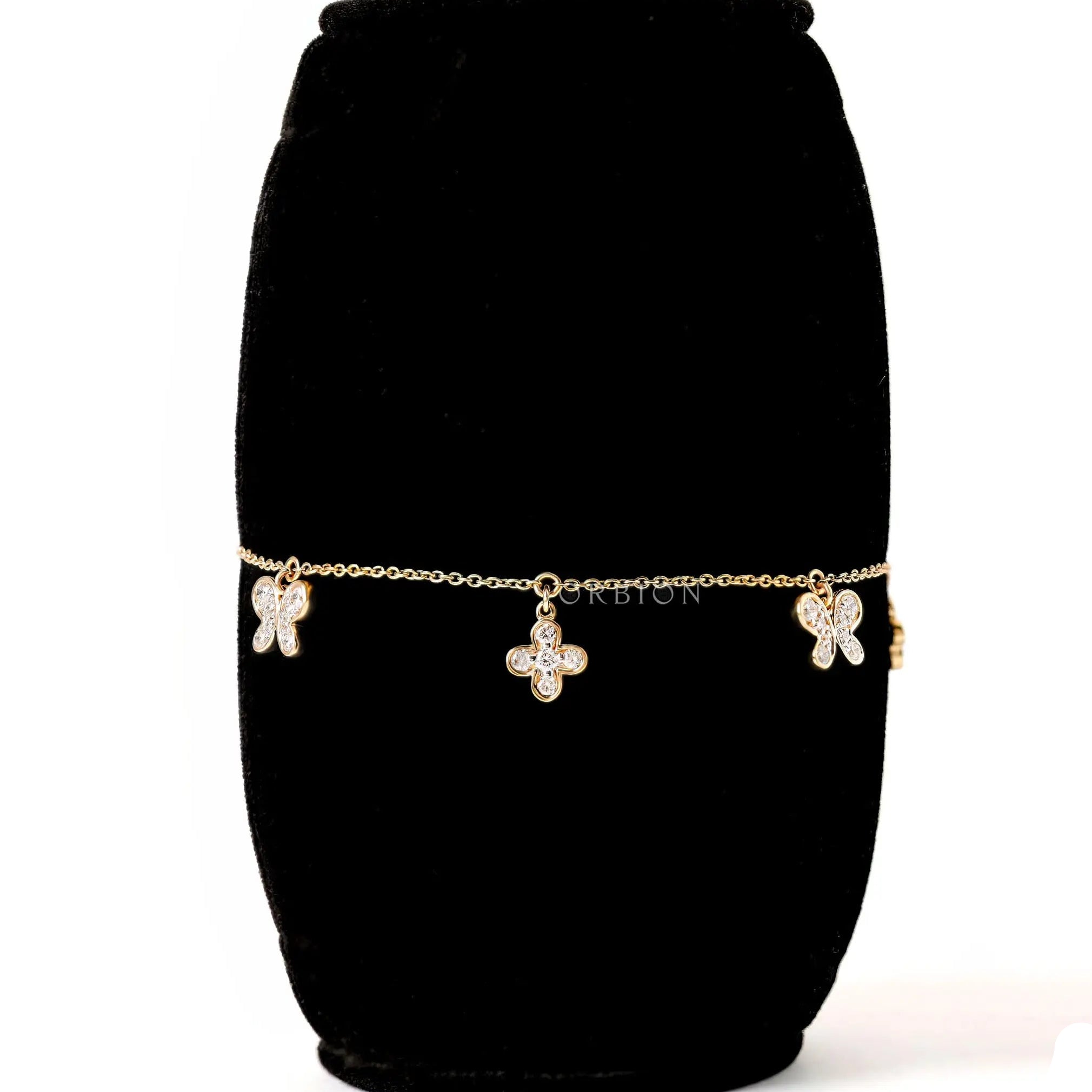 Front view lab grown diamond butterfly clover bolo bracelet in gold