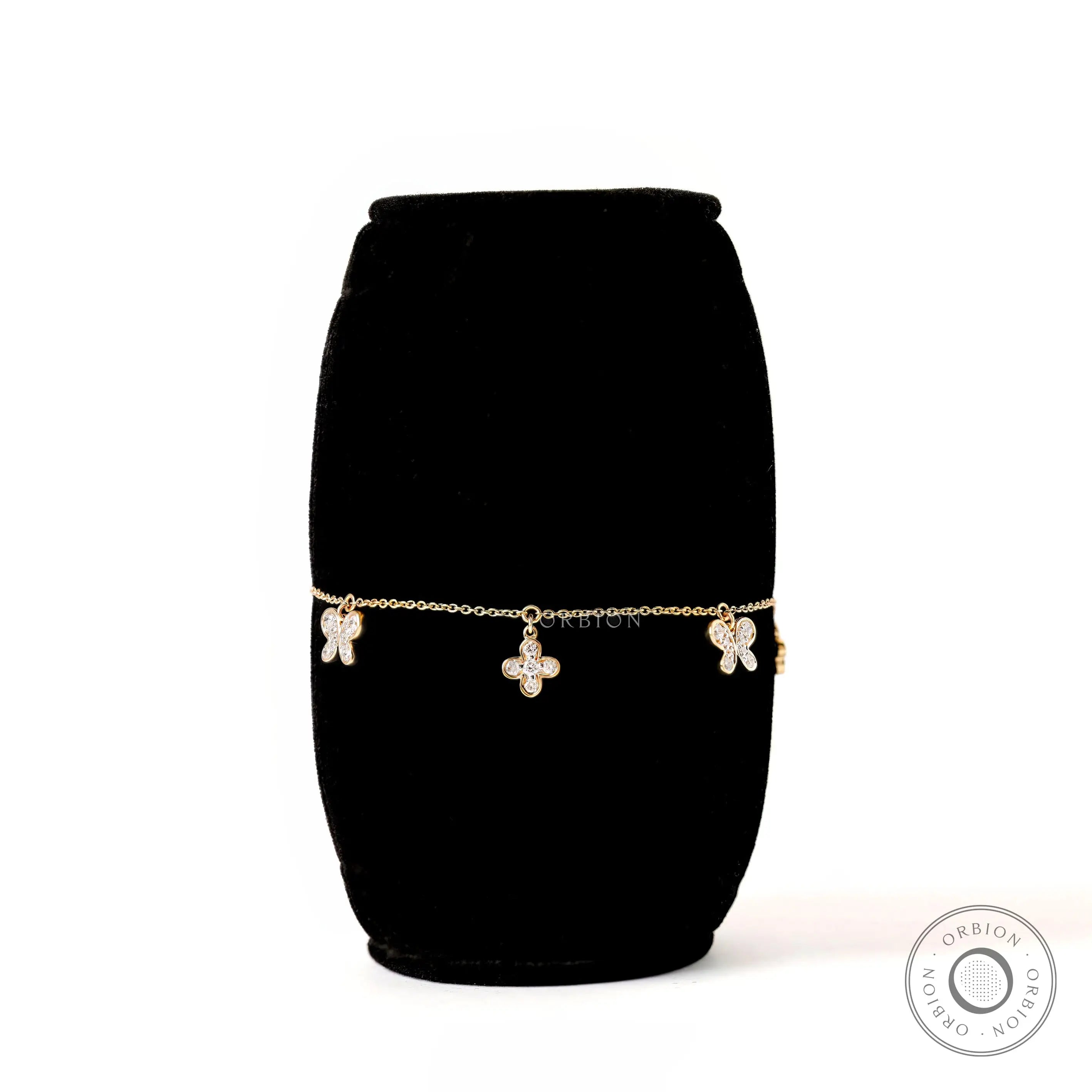Front view lab grown diamond butterfly clover bolo bracelet in gold