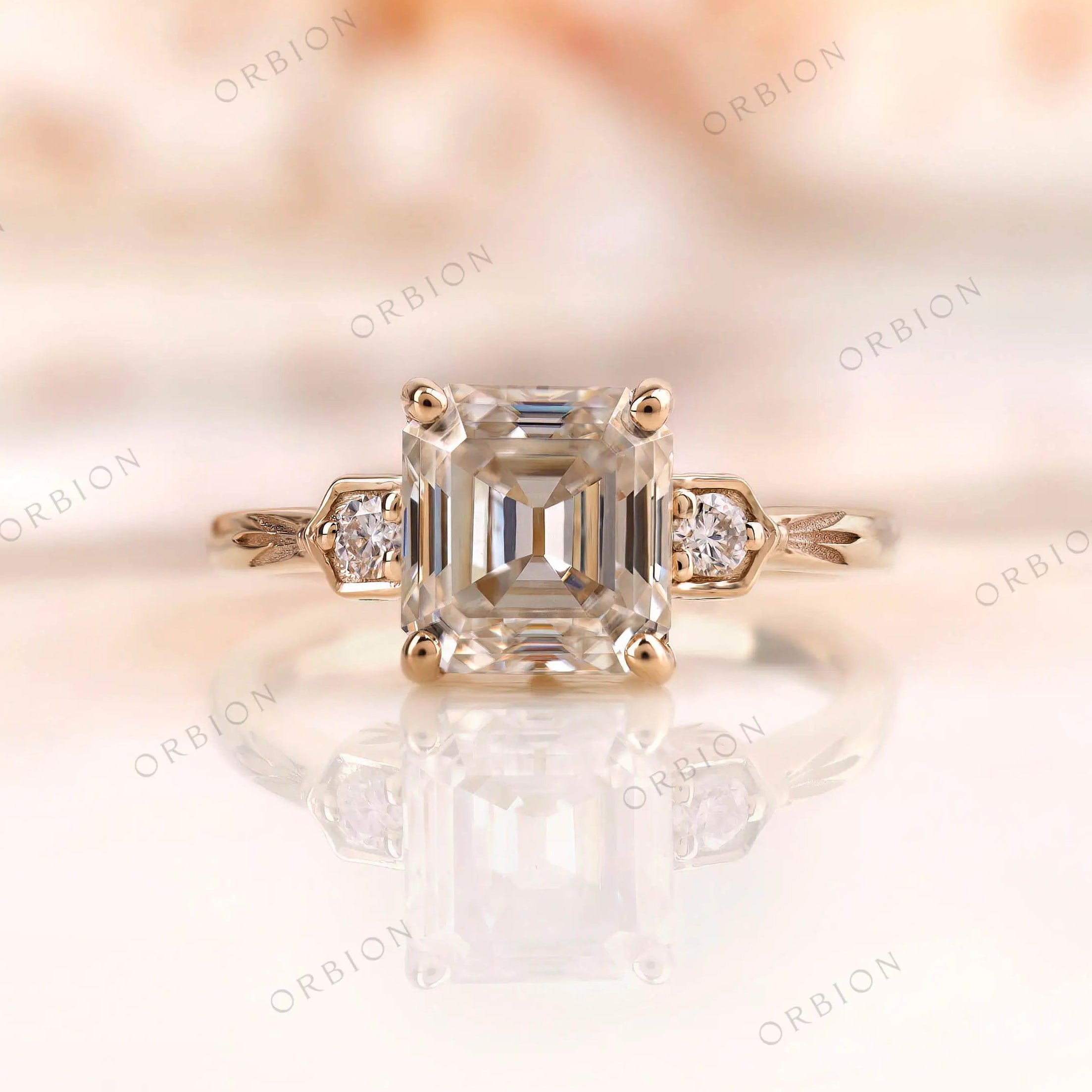 Floral engraved three stone asscher cut moissanite ring in gold