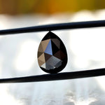 Rose cut black pear moissanite stone close-up