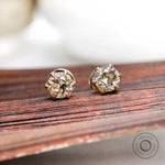 Close front OEC champagne moissanite stud earrings yellow gold