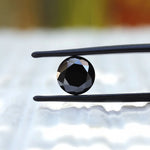 Close-up of 2 CT Round Old European Cut Black Moissanite