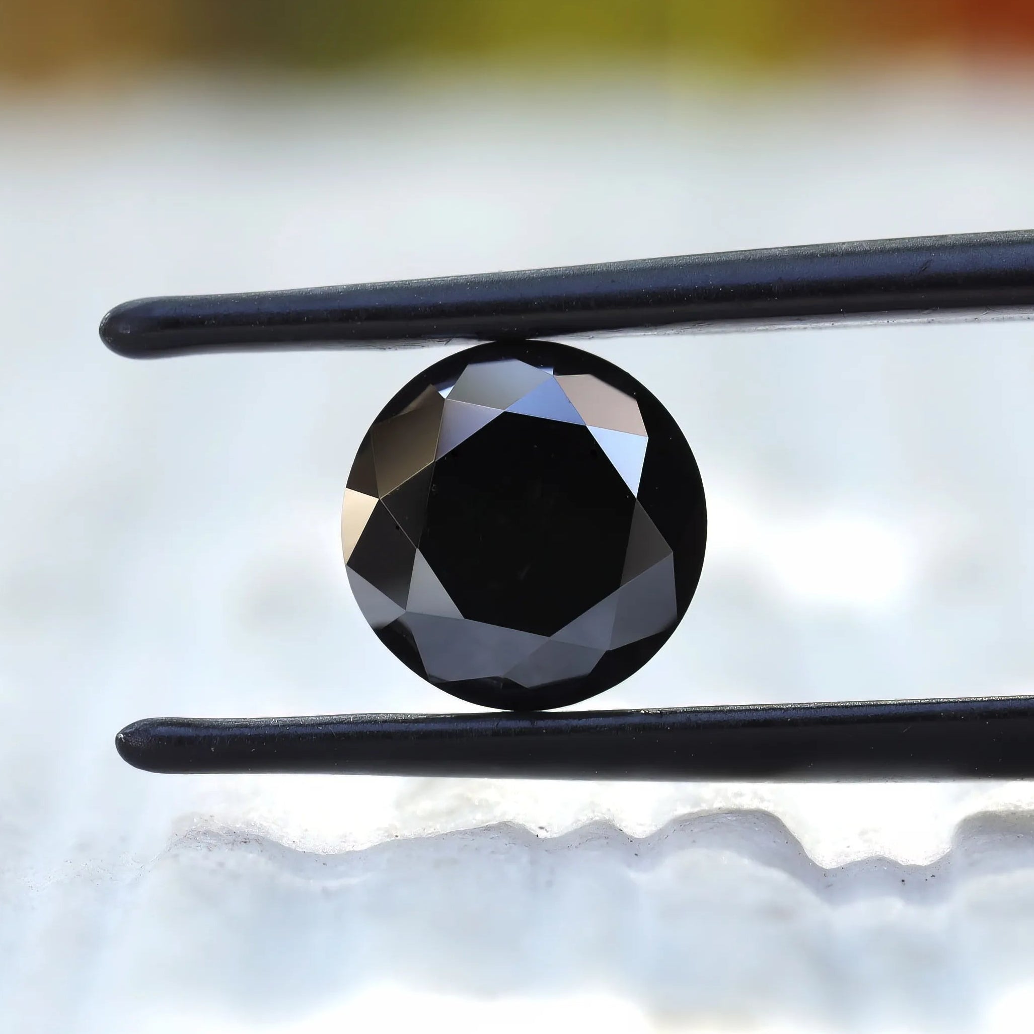 Close-up of 2 CT Round Old European Cut Black Moissanite