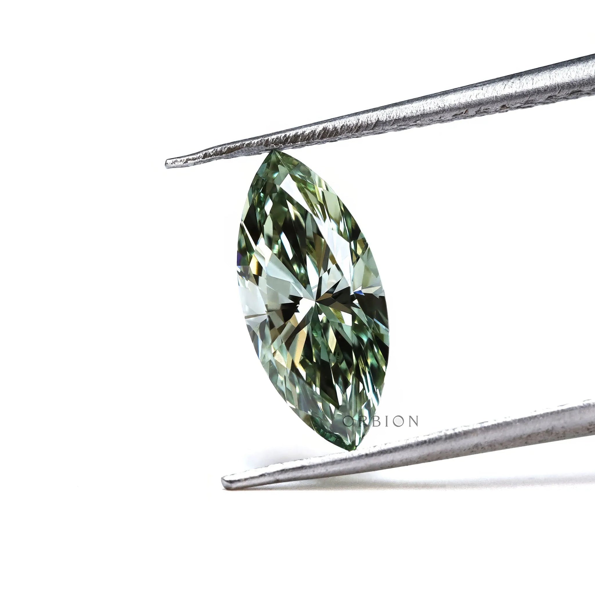 Fancy vivid green marquise lab diamond held in tweezers