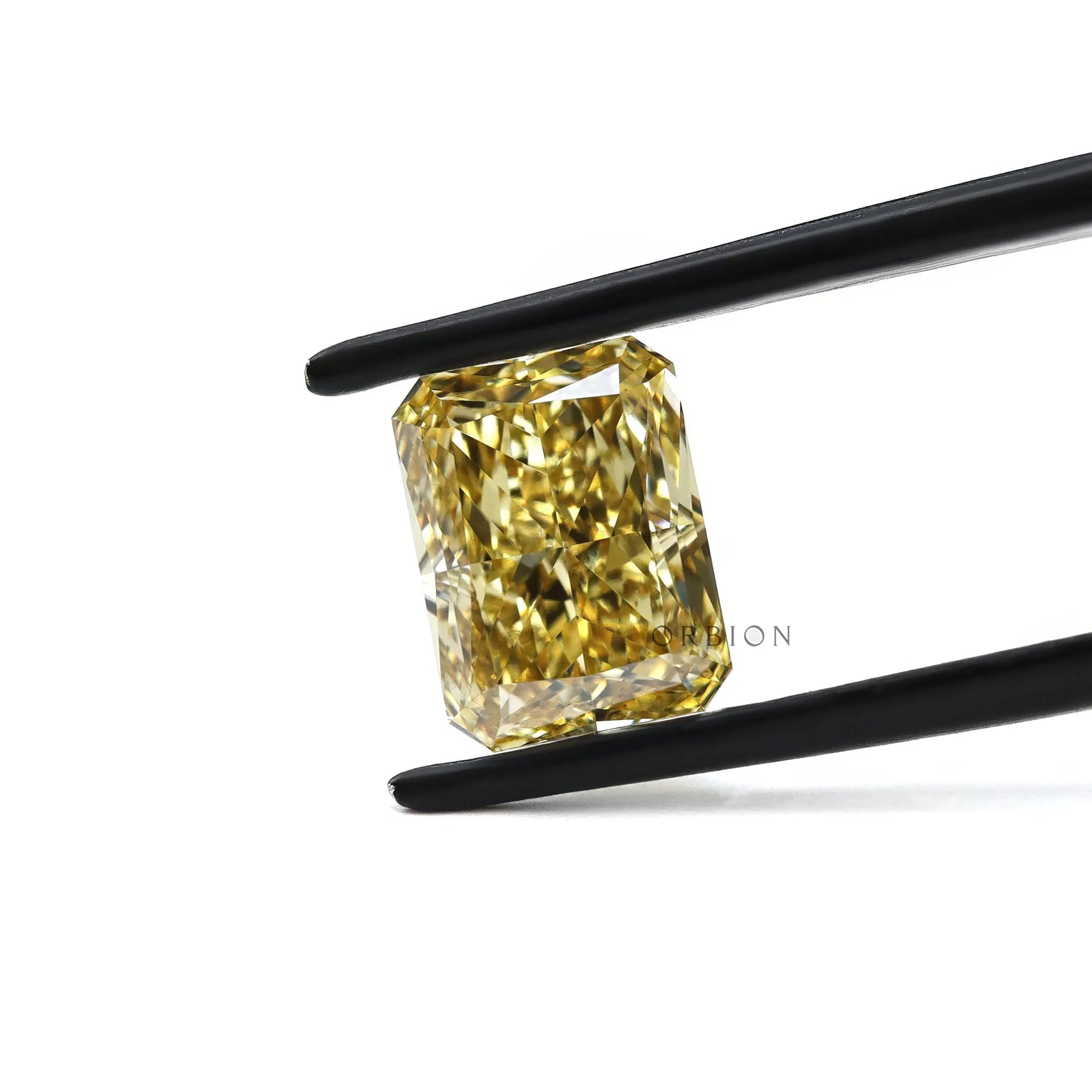 Radiant brilliant cut fancy yellow loose lab diamond side angle
