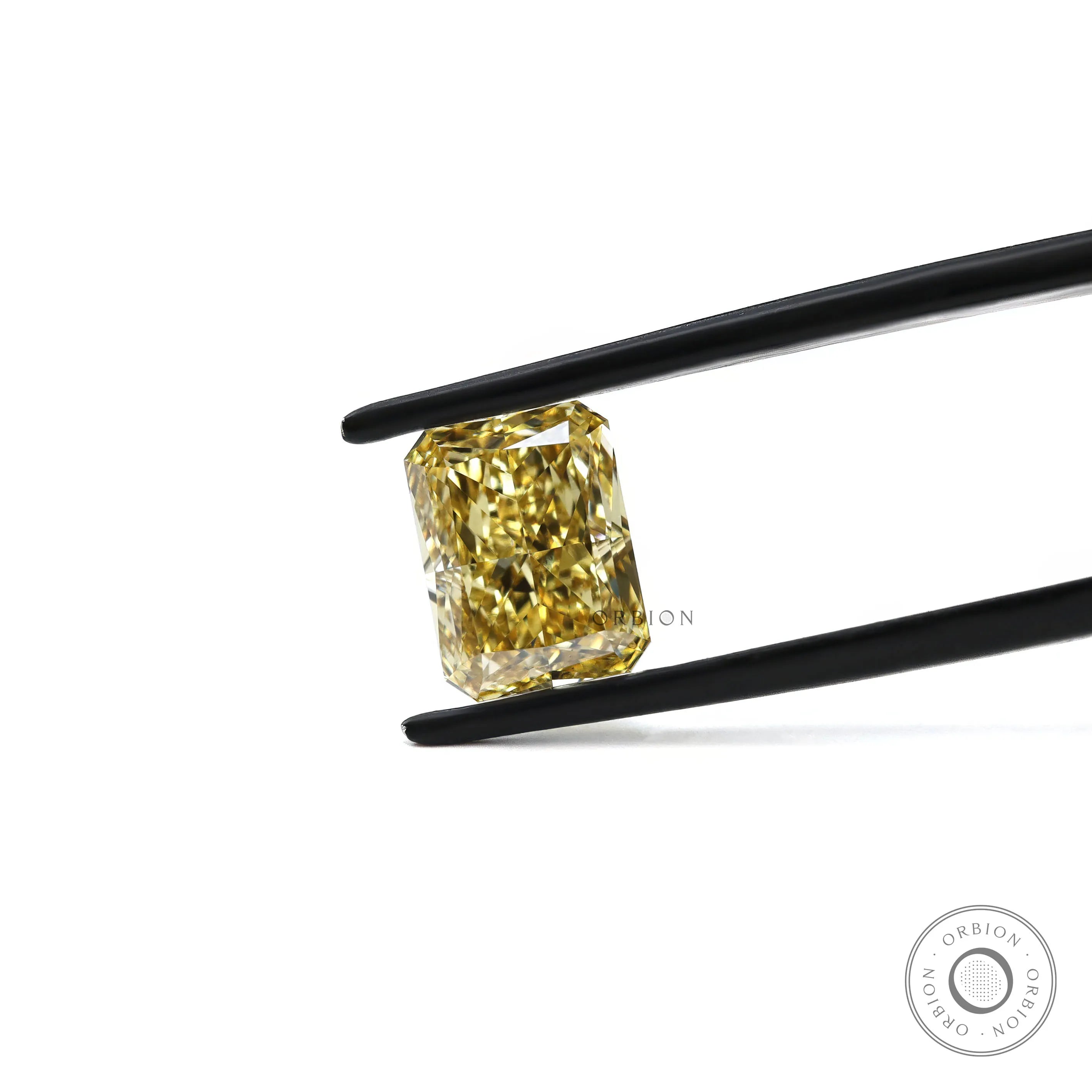 Radiant brilliant cut fancy yellow loose lab diamond side angle