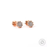 Angle view rose gold floral cluster diamond stud earrings