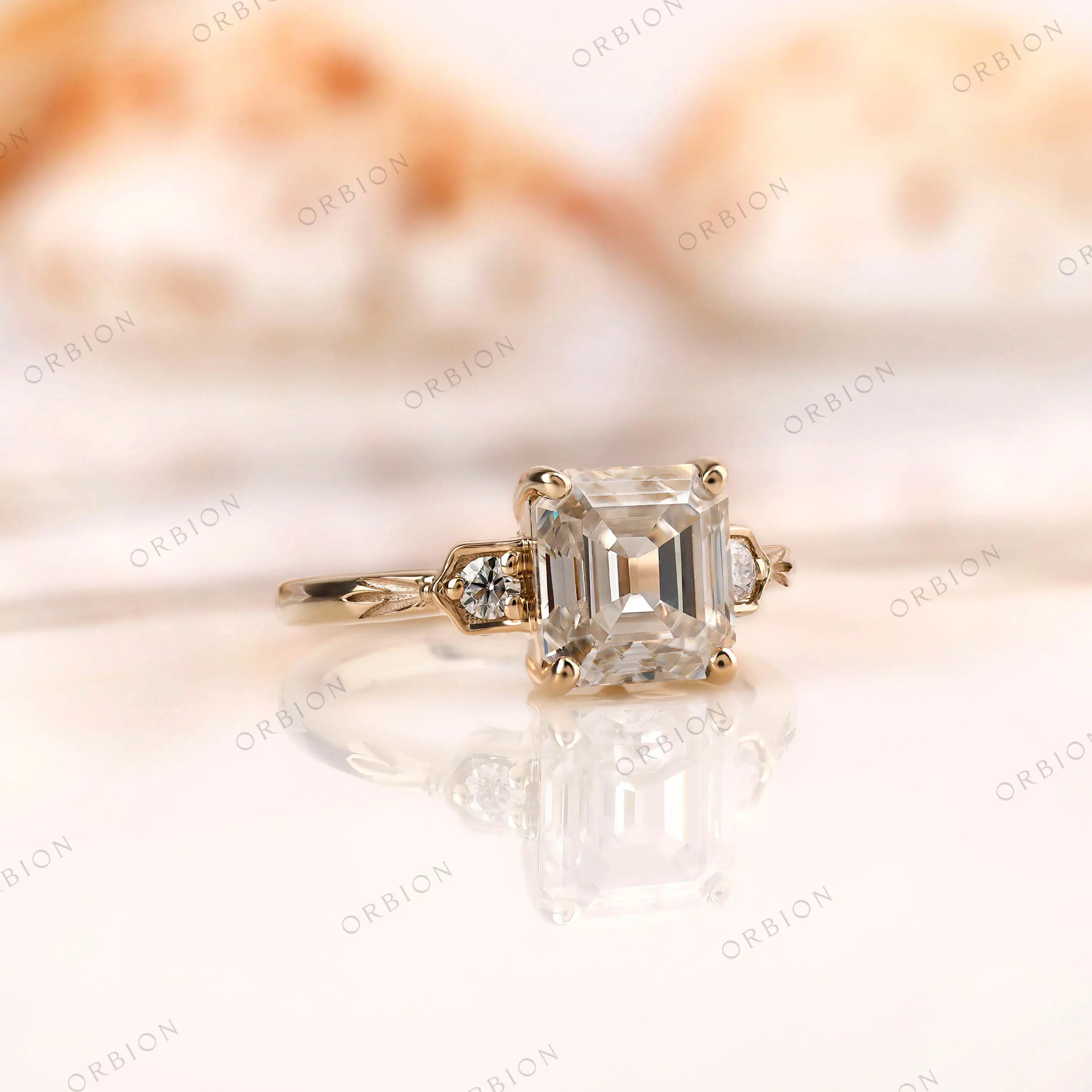 Elegant three stone asscher moissanite ring with floral band details