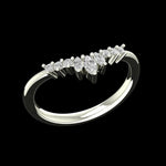Angled view of chevron marquise and round stone wedding band