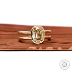 Alternate front elongated cushion champagne moissanite bezel ring gold