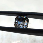 Close-up of 1.7 CT Old Mine Cut Cushion Grey Moissanite Stone