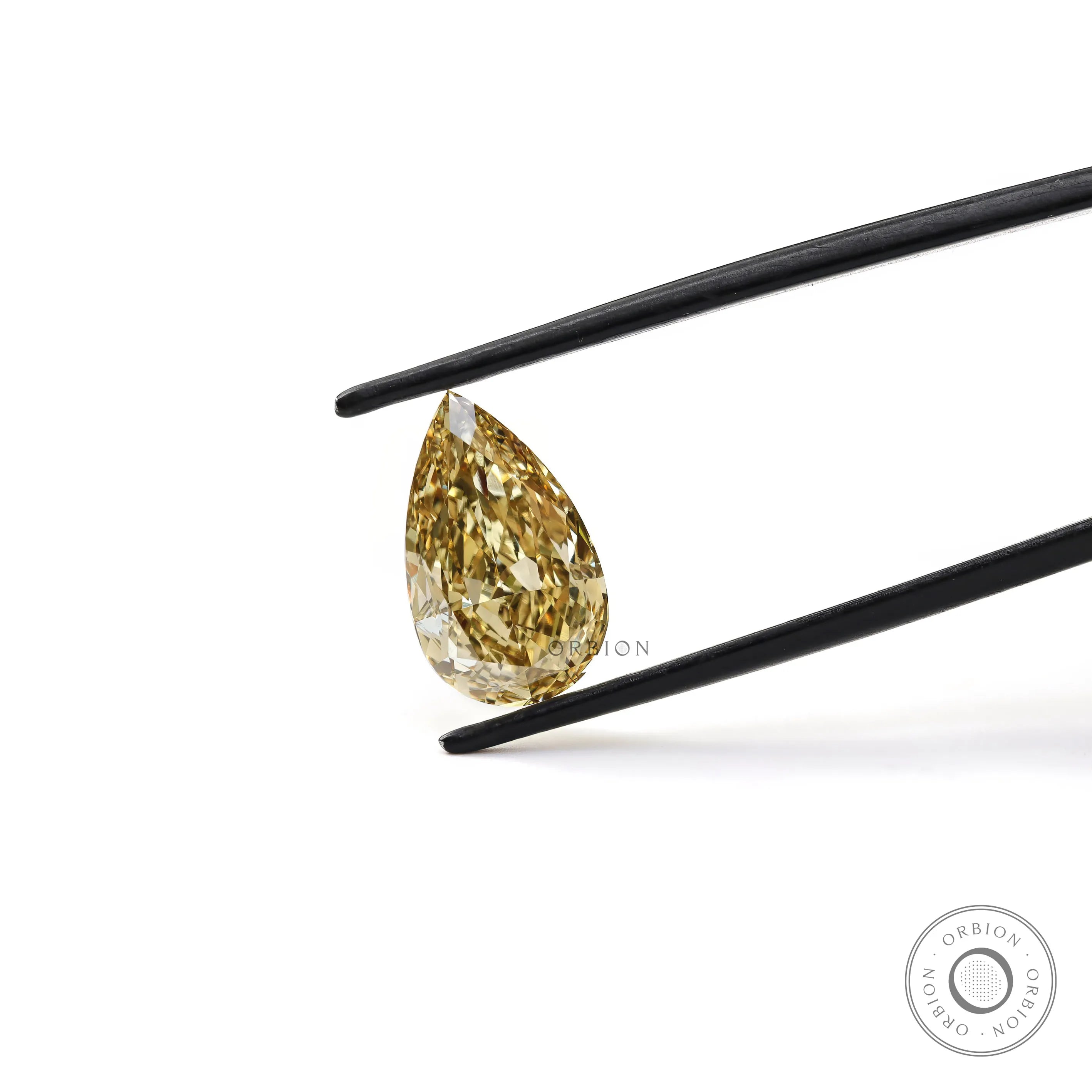 Pear brilliant cut yellow lab diamond side angle view