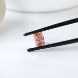 Angled view of matched pink radiant diamond pair