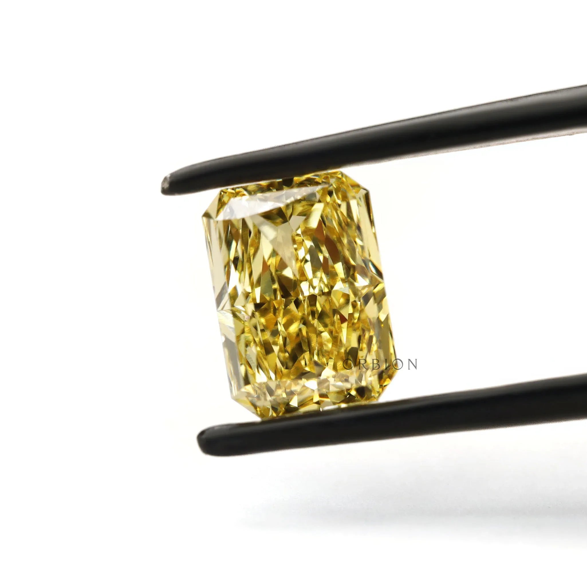 Yellow radiant loose lab diamond close front view