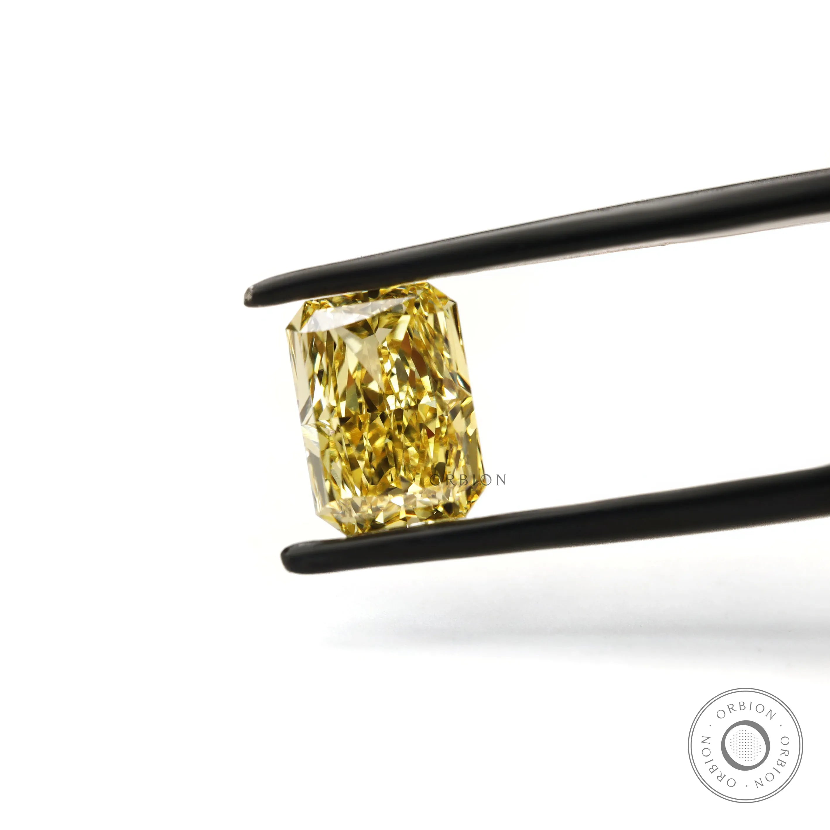 Yellow radiant loose lab diamond close front view