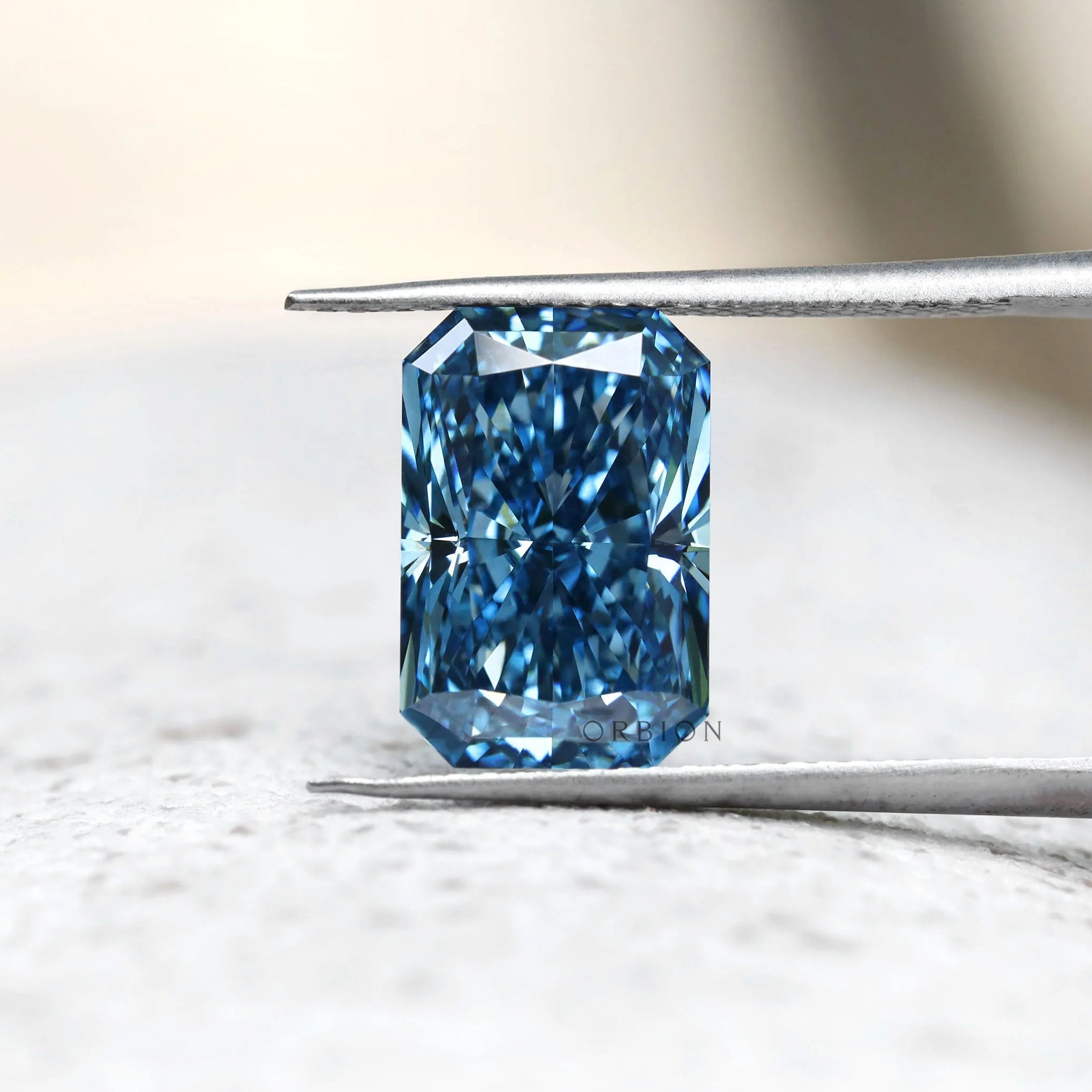 Front view of blue radiant brilliant cut loose lab diamond