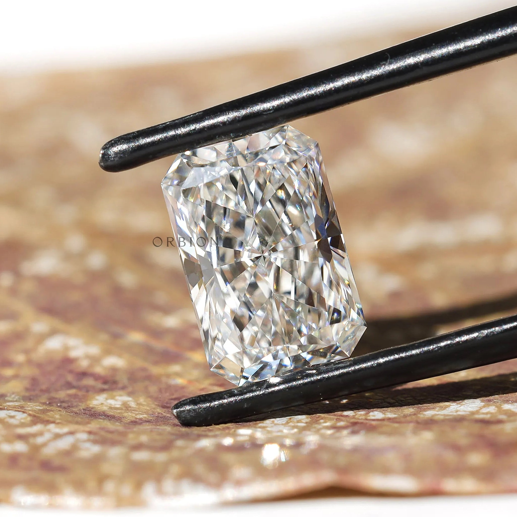 Angled close-up of radiant brilliant loose lab diamond