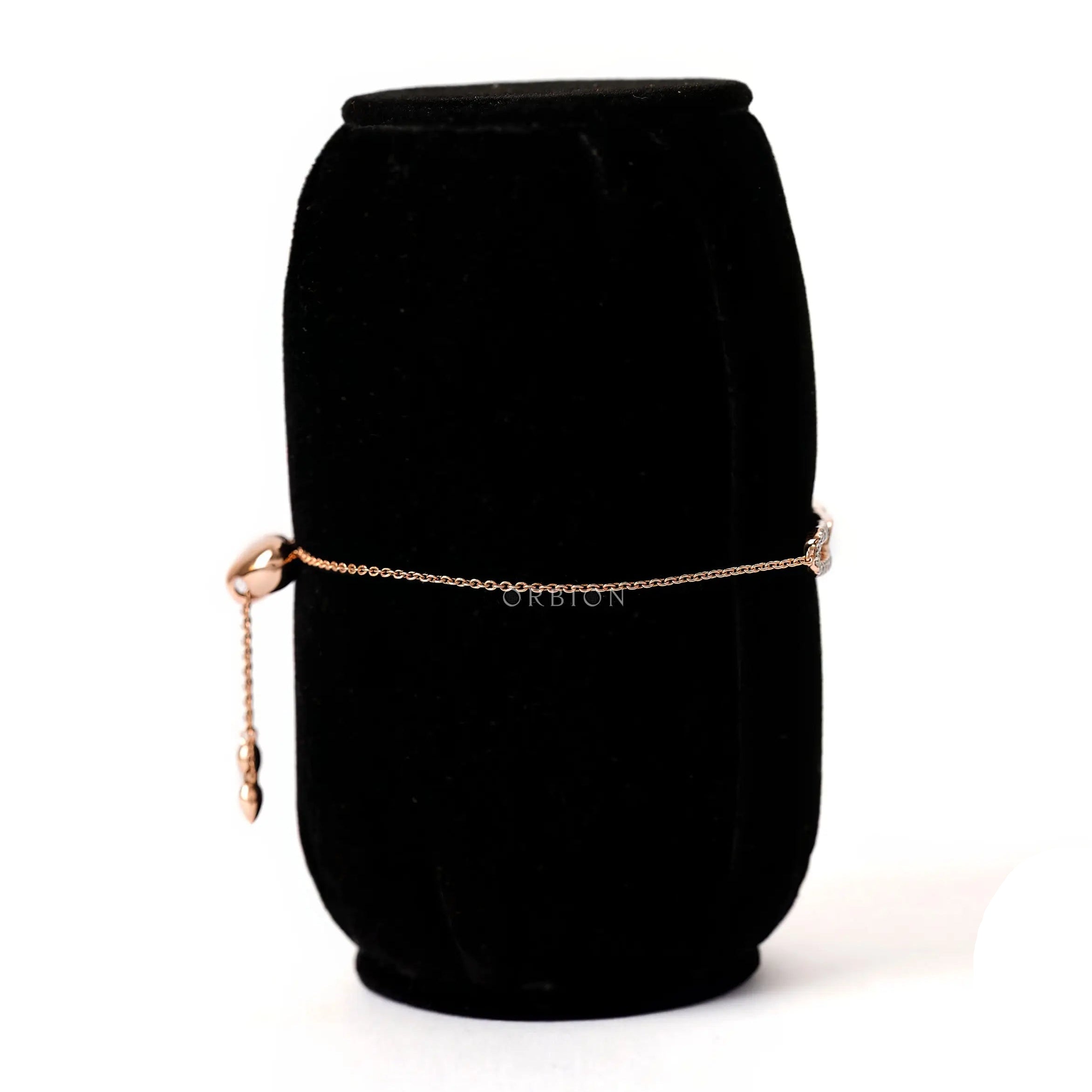 Side profile view minimal yellow gold link bolo bracelet