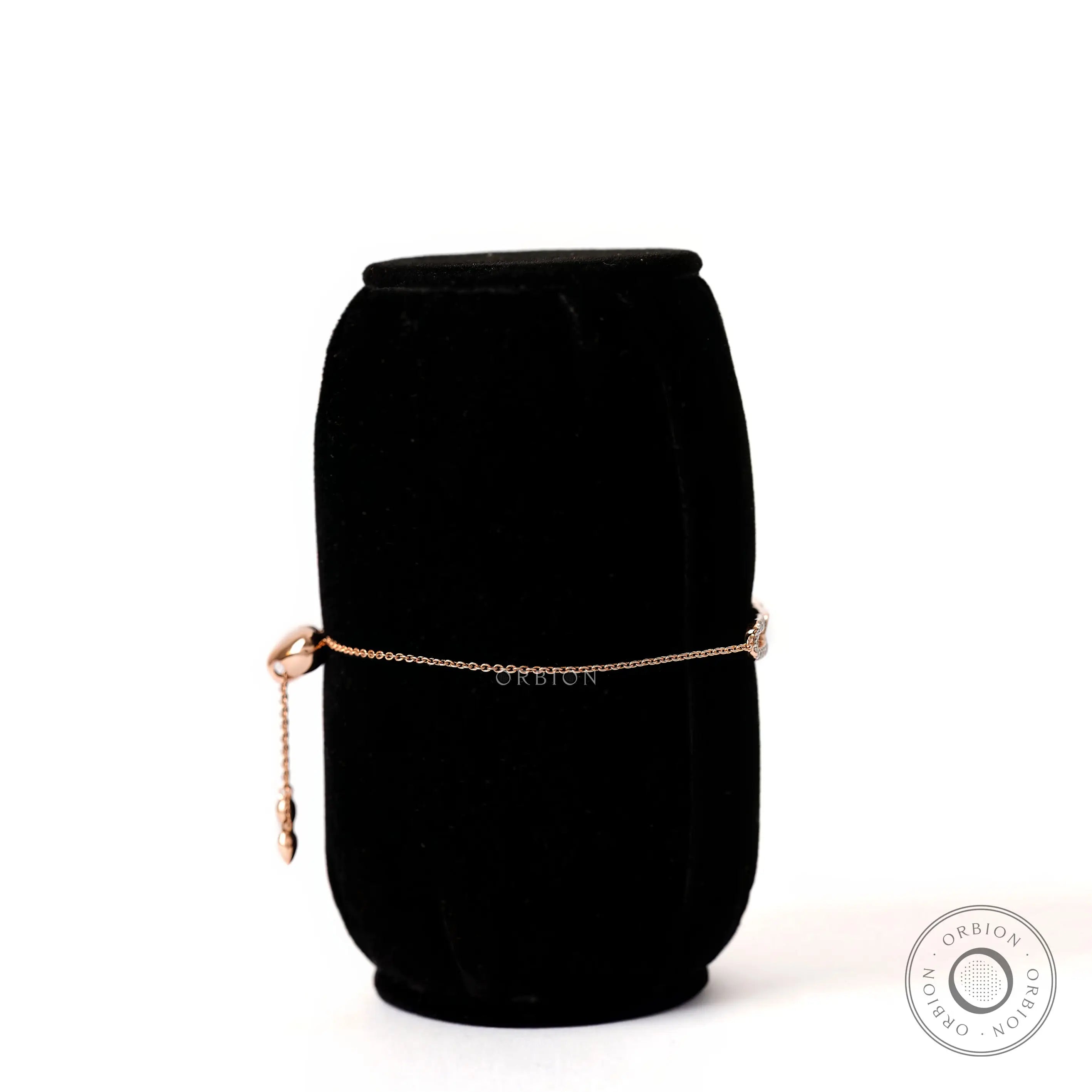 Side profile view minimal yellow gold link bolo bracelet
