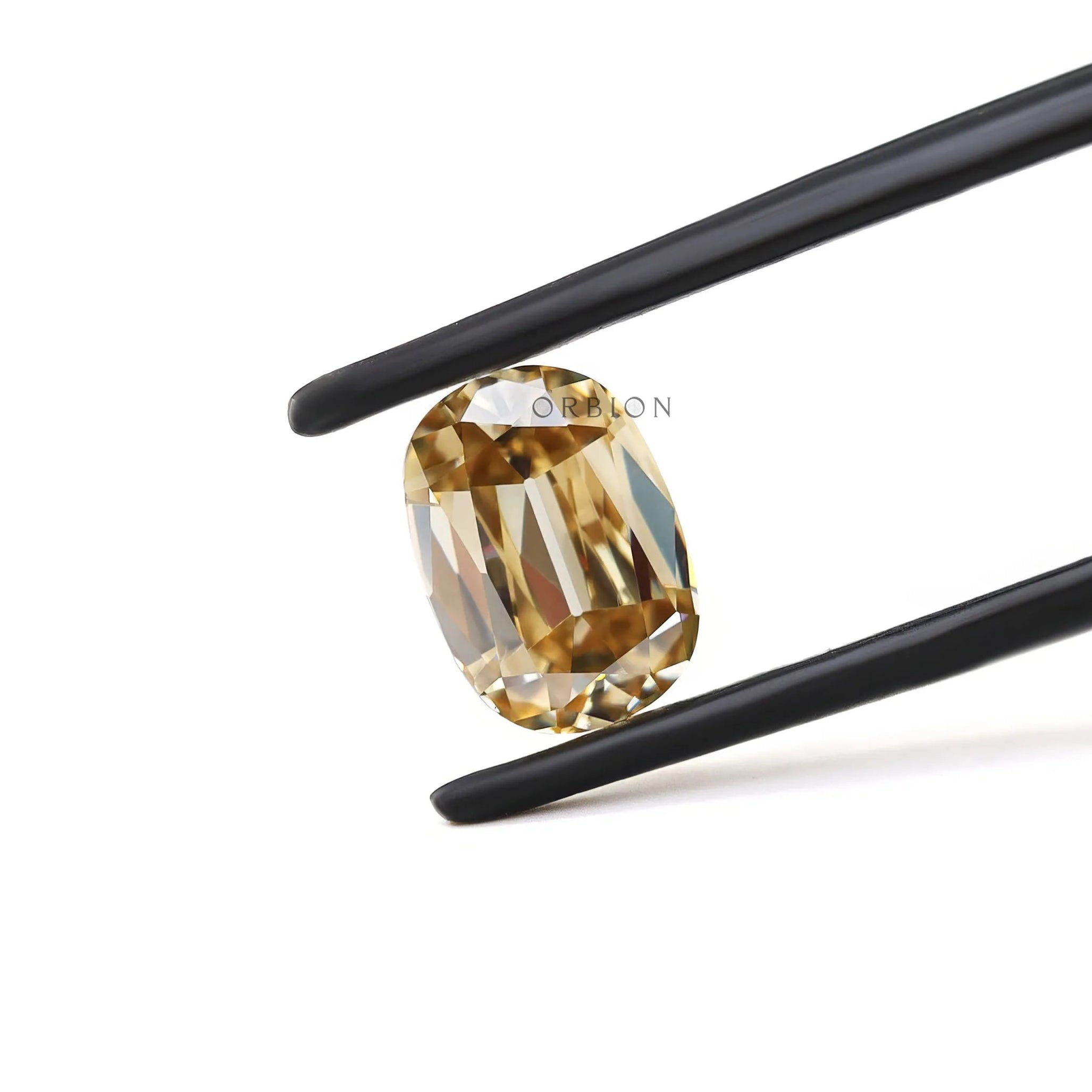 Front view of champagne elongated cushion loose moissanite