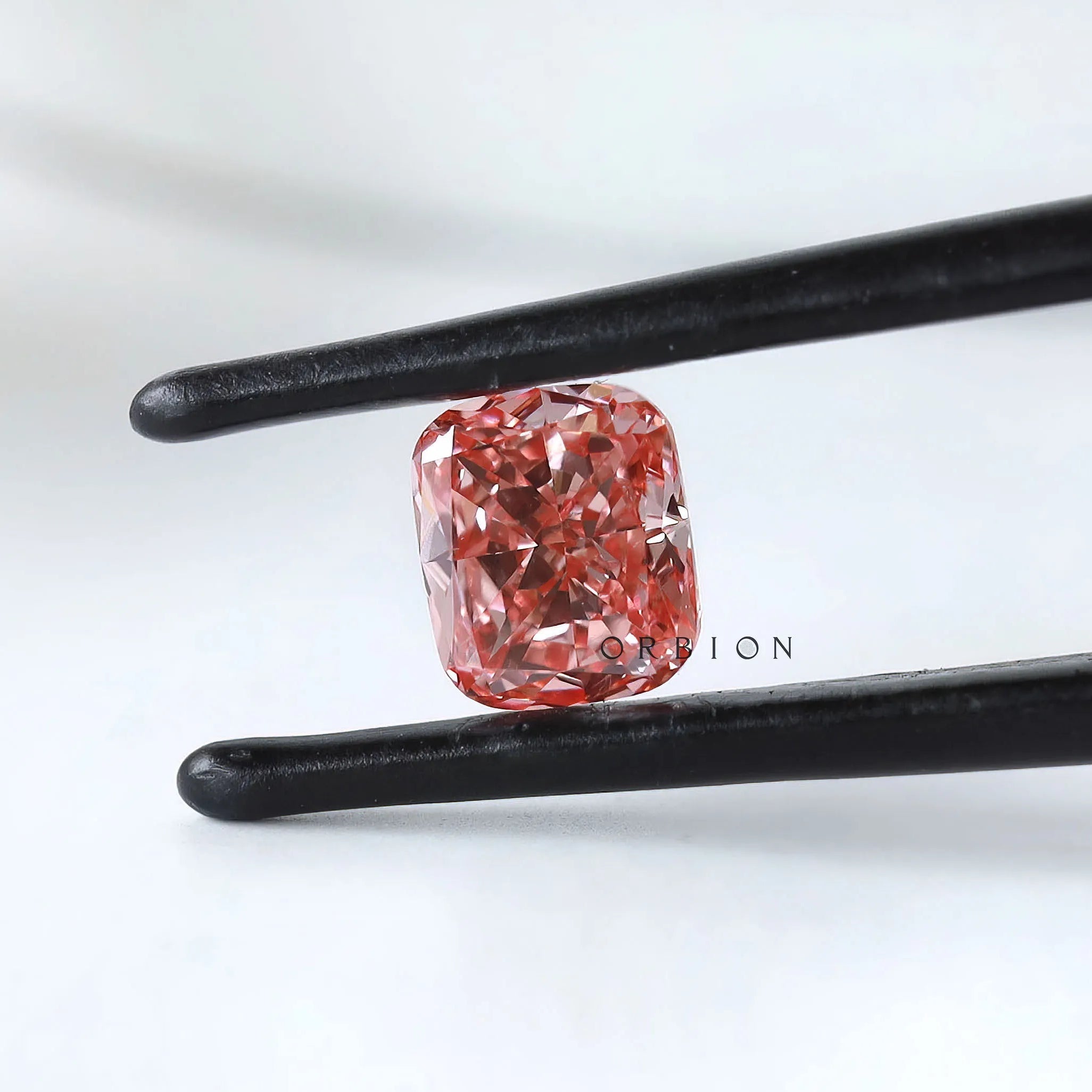 Front view of vivid pink cushion loose lab diamond
