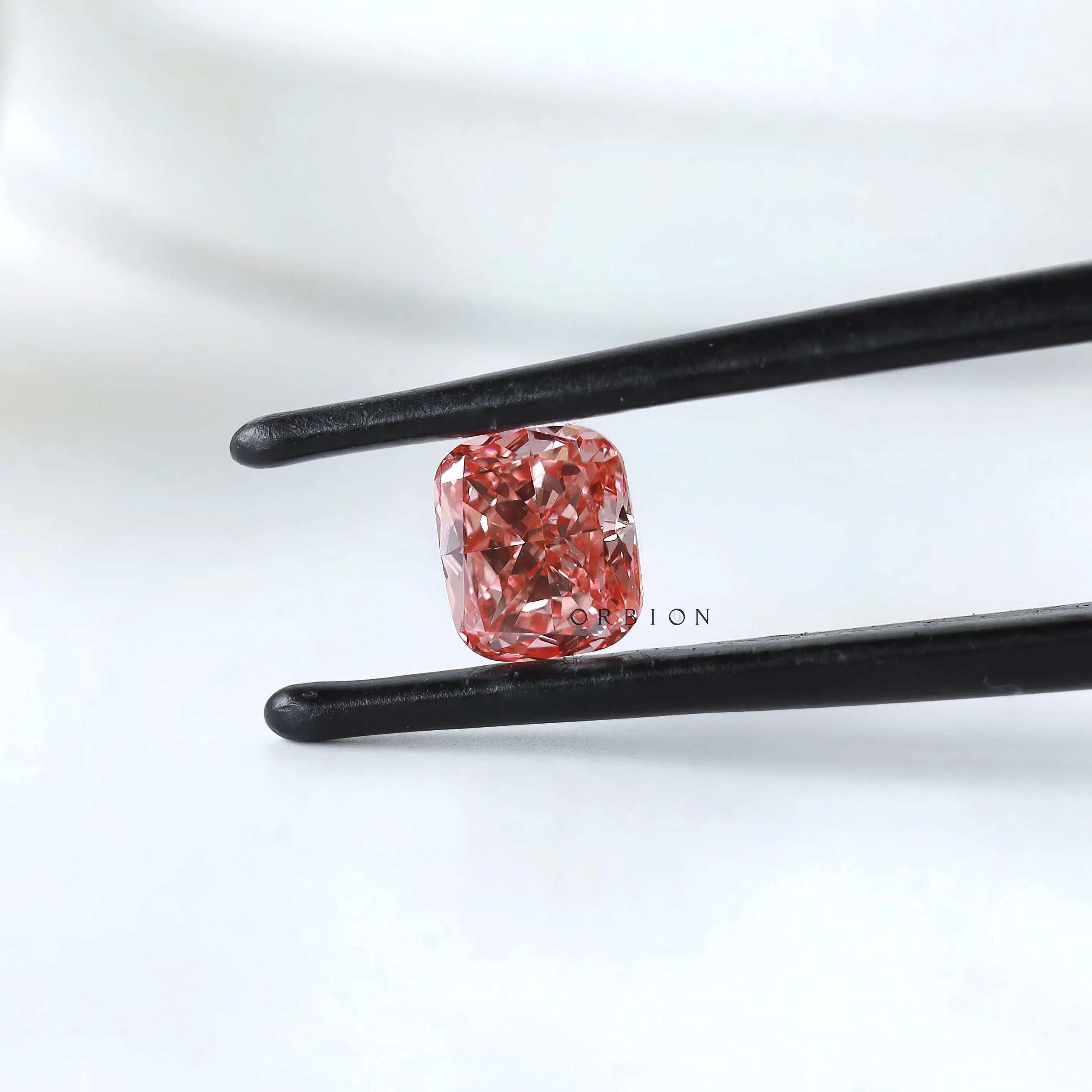 Front view of vivid pink cushion loose lab diamond