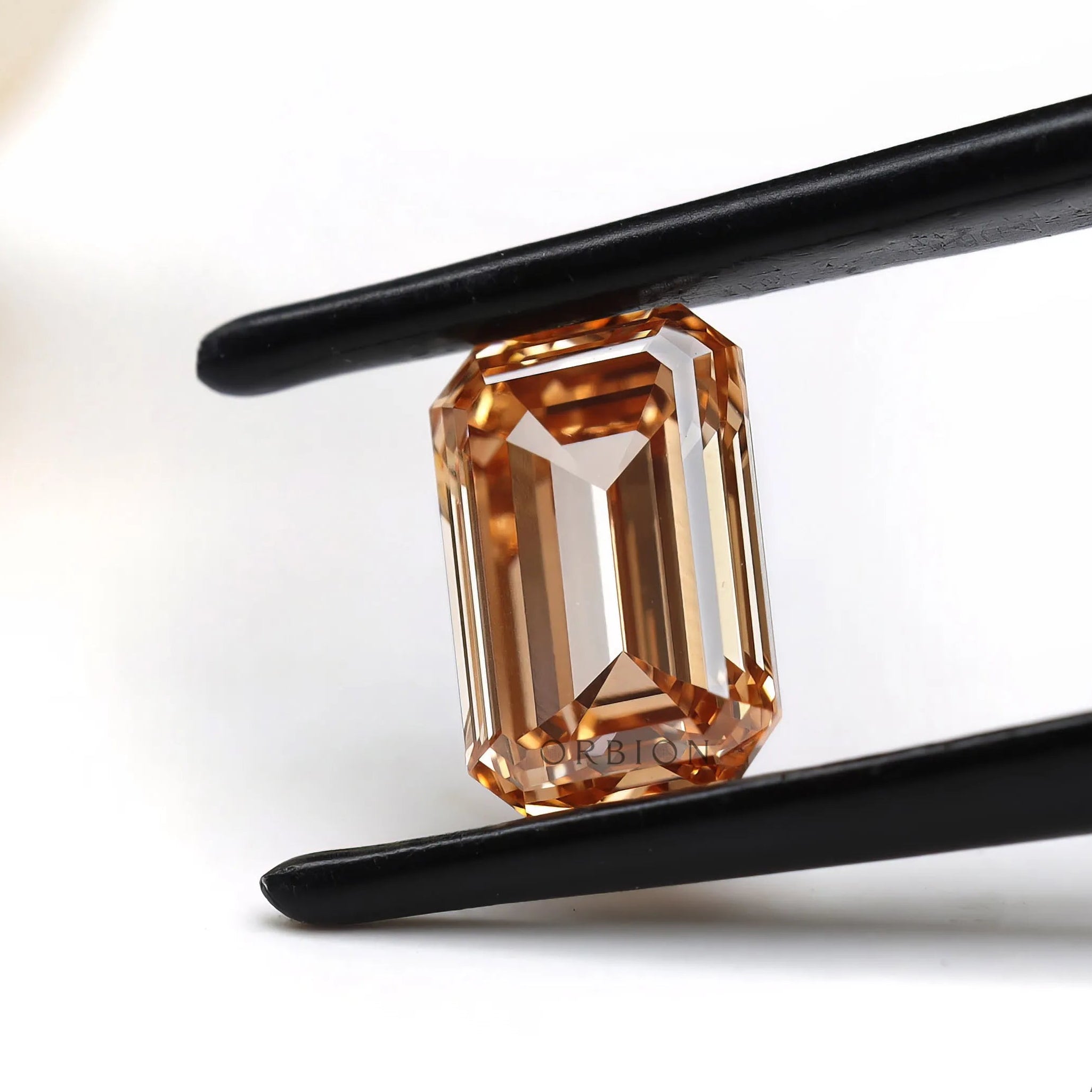 Front view orange emerald step cut lab diamond