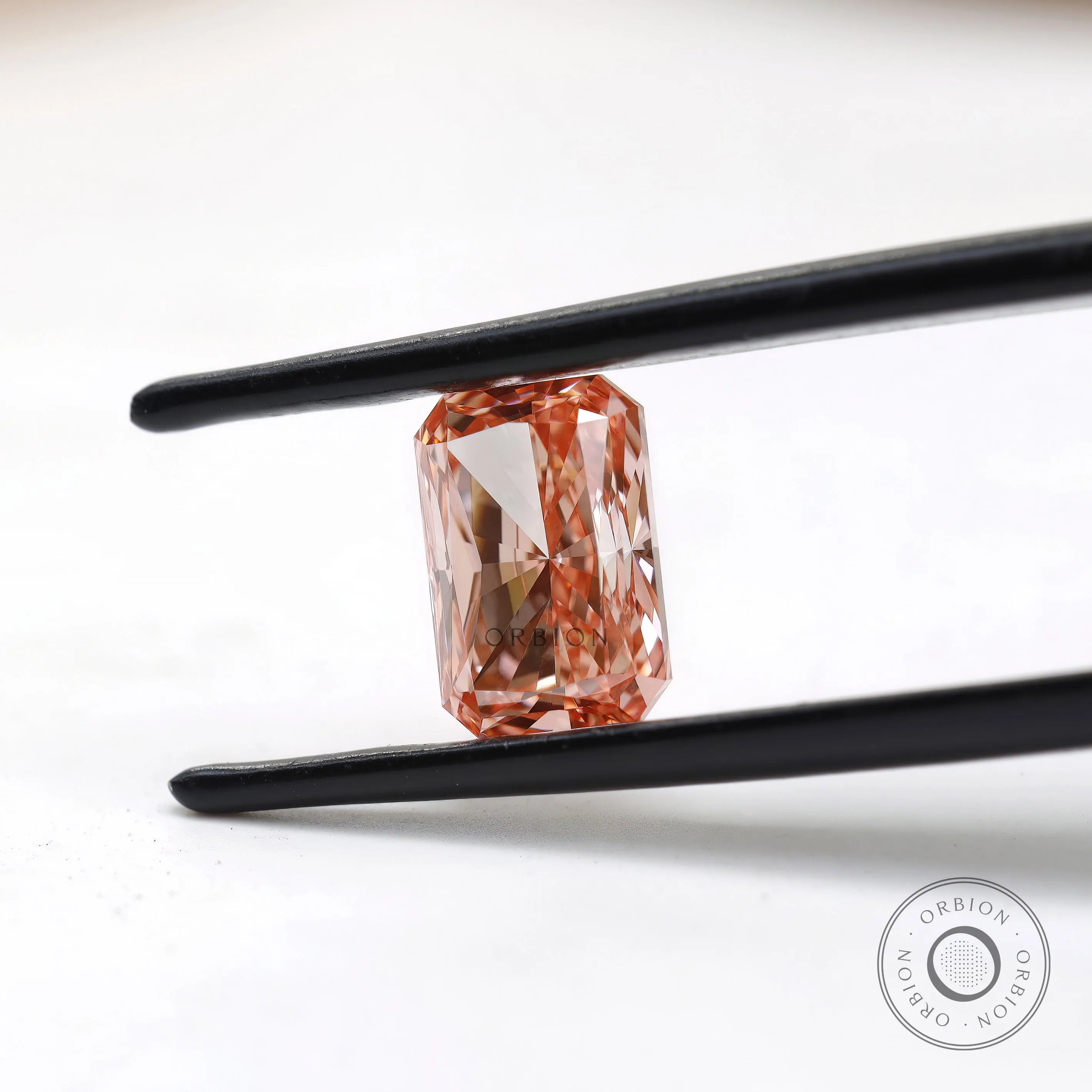 Front angled radiant brilliant cut fancy pink loose diamond