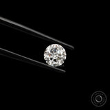 Angled view round nova cut loose lab diamond against black background