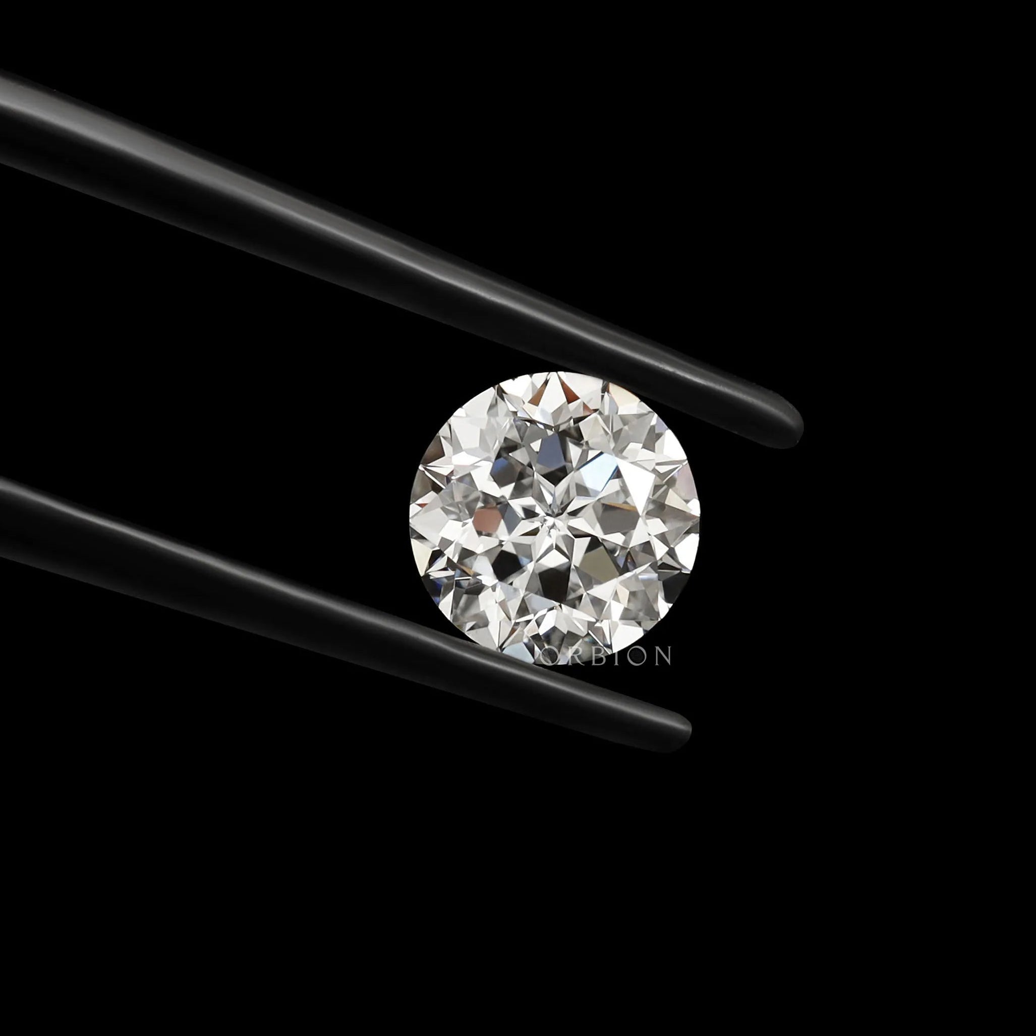 Angled view round nova cut loose lab diamond against black background