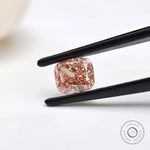 Angled view of fancy pink cushion brilliant lab diamond