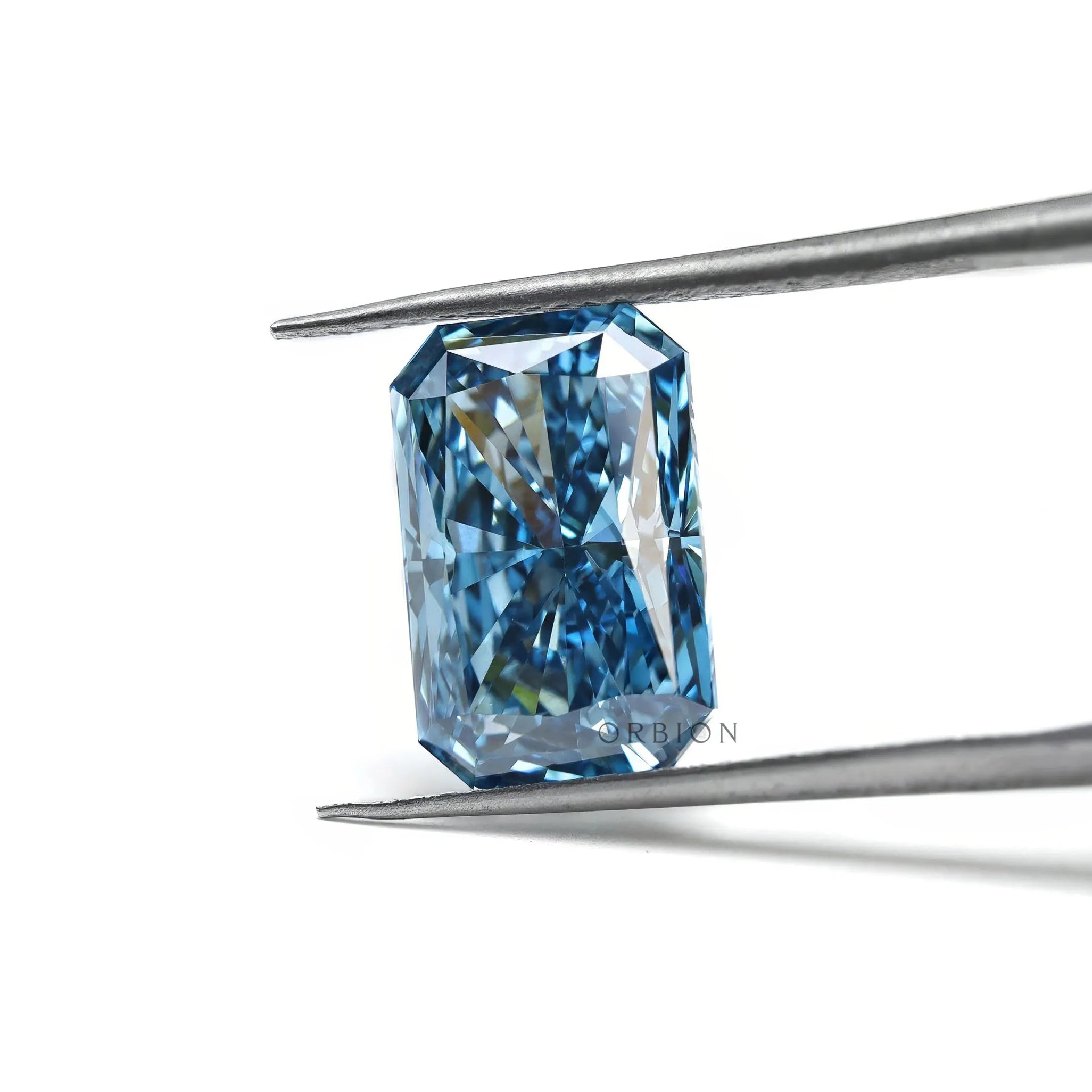 Angled view of vivid blue radiant cut lab diamond