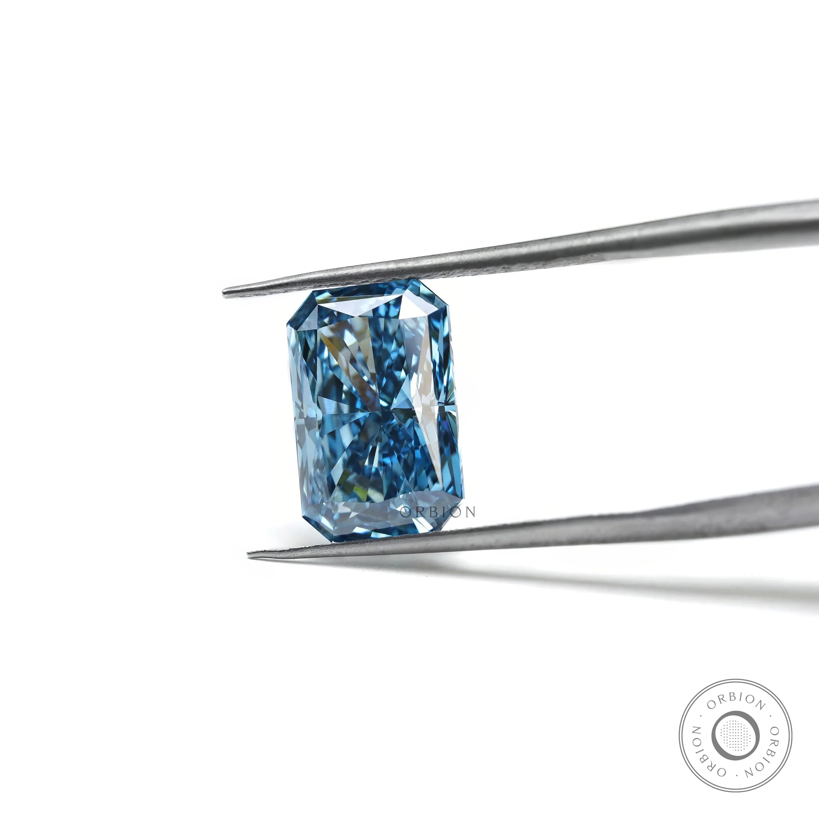 Angled view of vivid blue radiant cut lab diamond