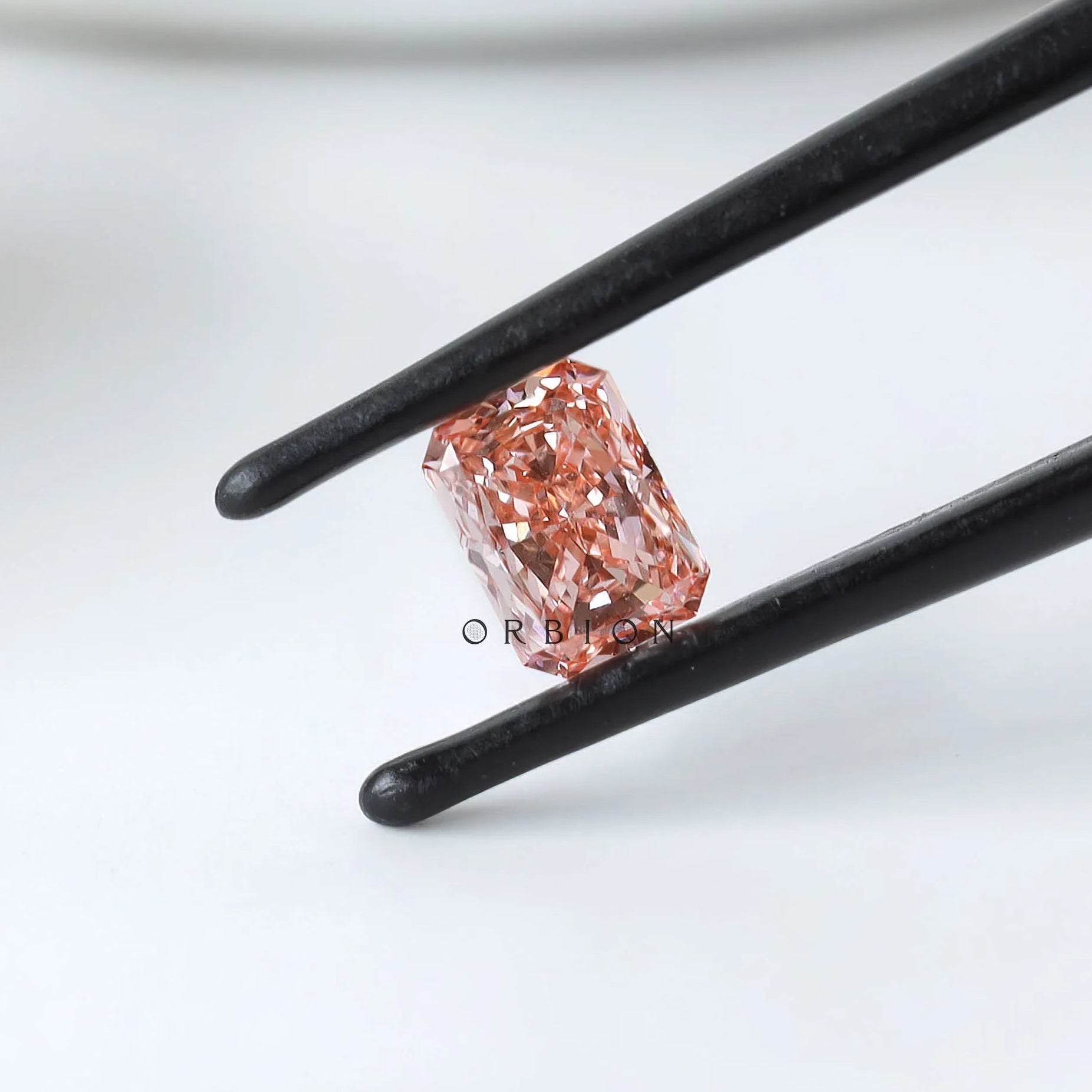 Closed up view of matched pink radiant diamond pair