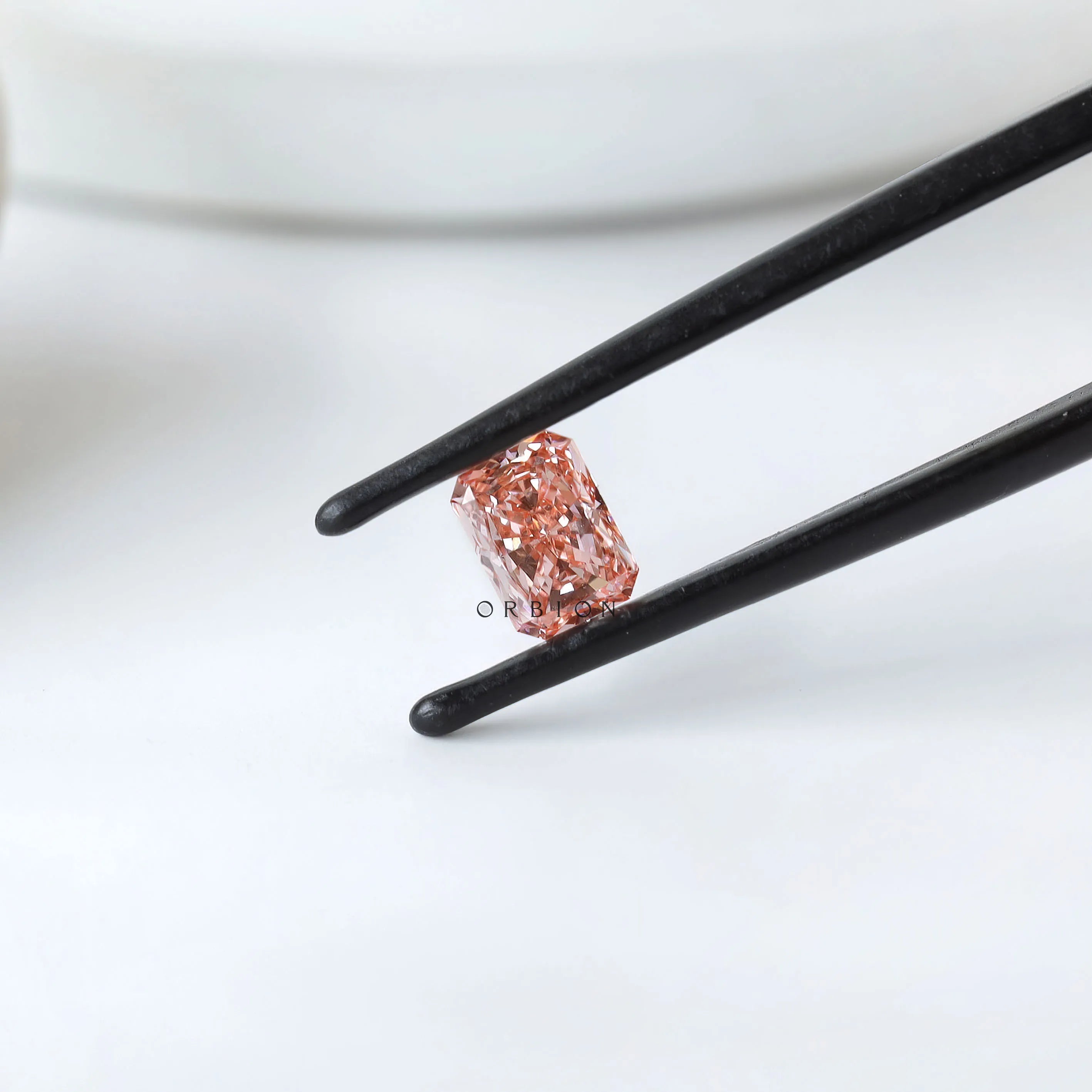 Closed up view of matched pink radiant diamond pair