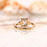 Back view of floral details on asscher moissanite ring in yellow gold