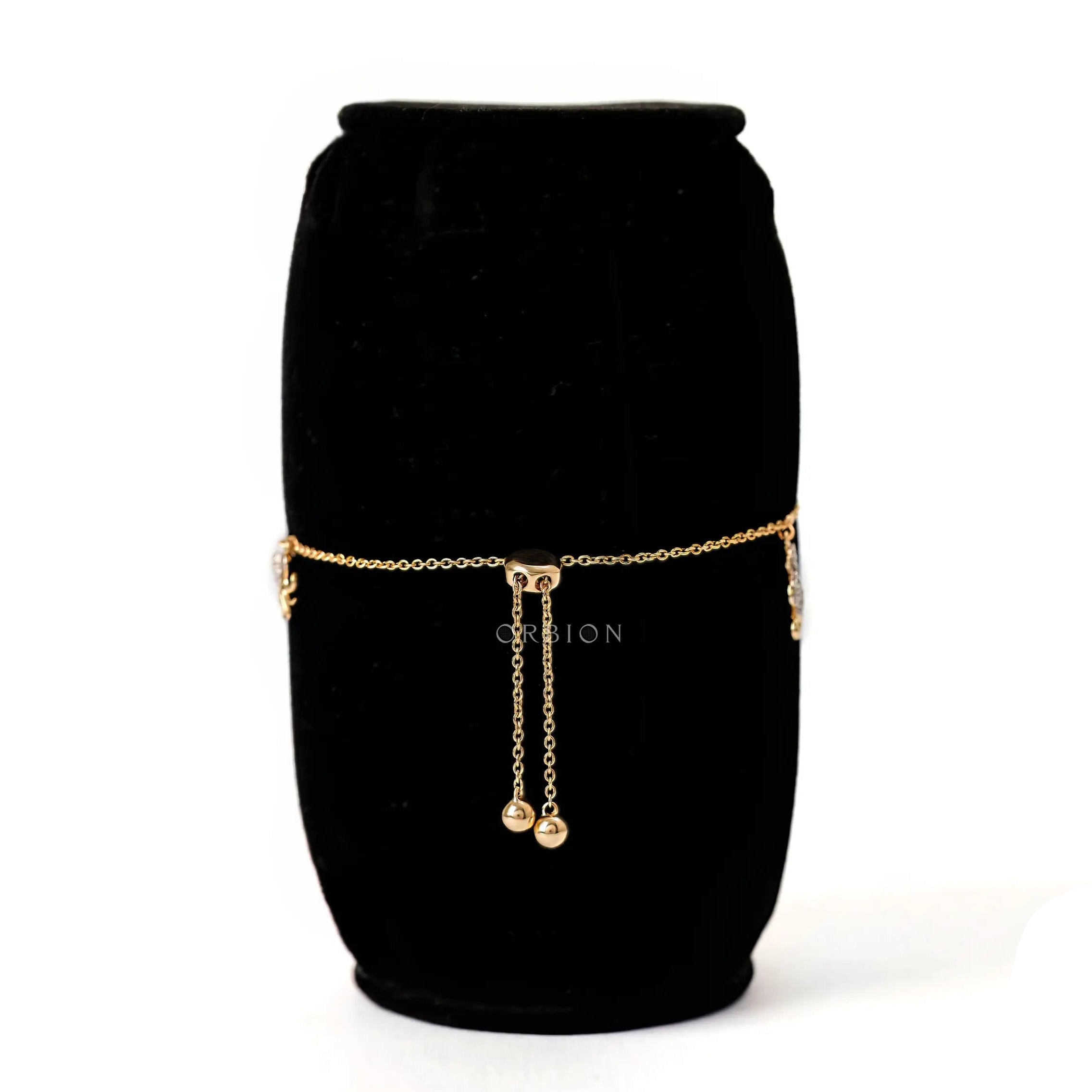 Back closure view yellow gold ocean charm bolo bracelet