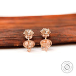 Back view of rose gold moissanite stud earrings