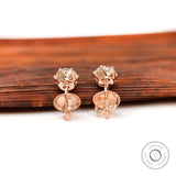 Back view of rose gold moissanite stud earrings