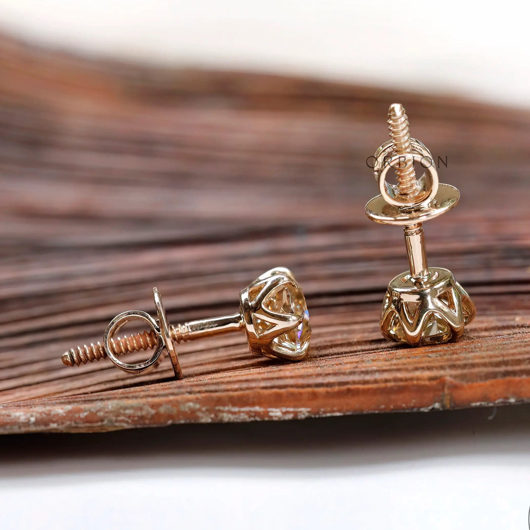 Side back view screw back moissanite stud earrings yellow gold