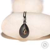 Back view of oxidized sterling silver pear pendant