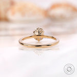 Back view of elongated cushion solitaire ring with tulip basket