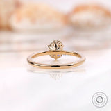 Back view of elongated cushion solitaire ring with tulip basket