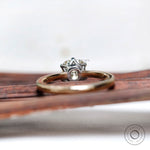 Back view of two tone gold moissanite engagement ring