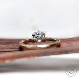 Back view of two tone gold moissanite engagement ring